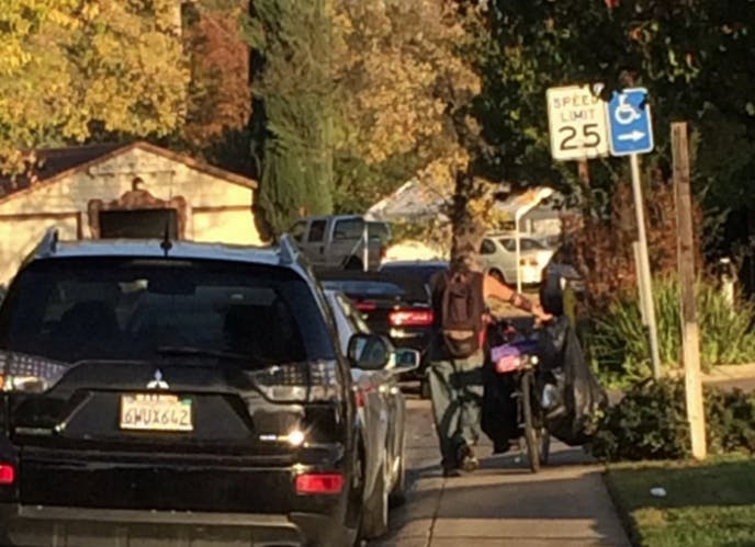 May contain: vehicle, car, transportation, automobile, human, and person