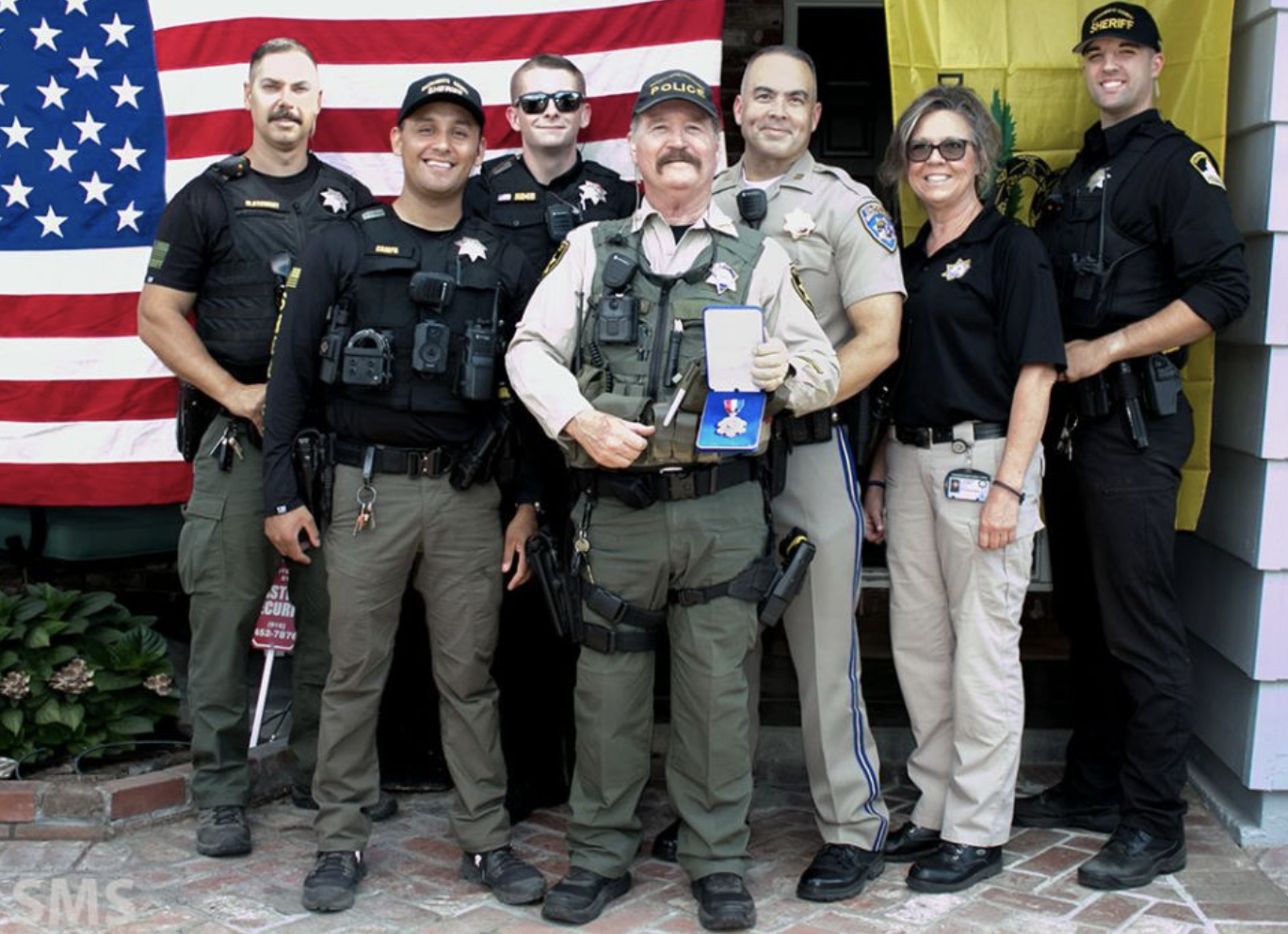 May contain: officer, person, police officer, adult, male, man, clothing, footwear, and shoe