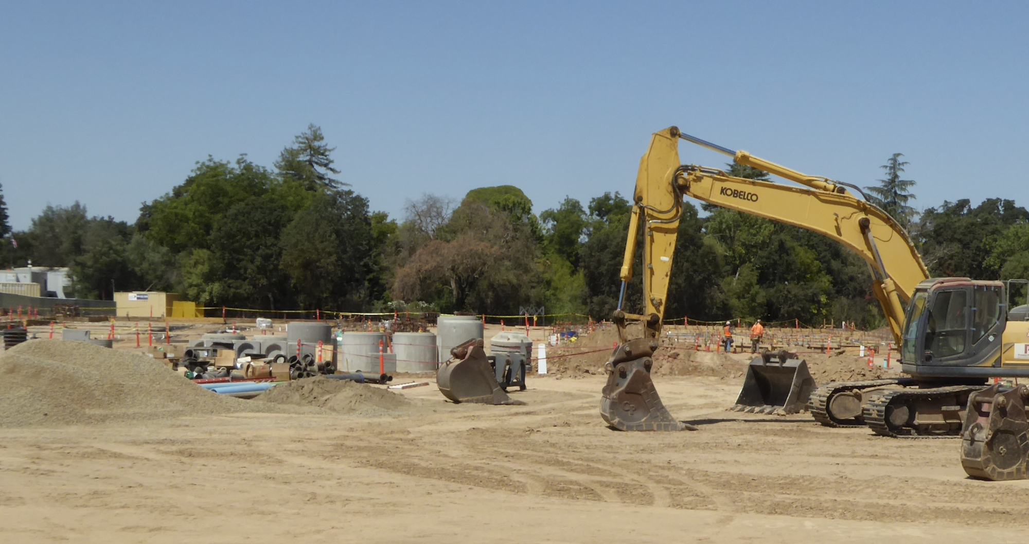 May contain: person, bulldozer, and machine