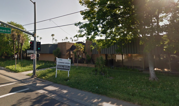 May contain: light, traffic light, urban, town, road, building, street, and city