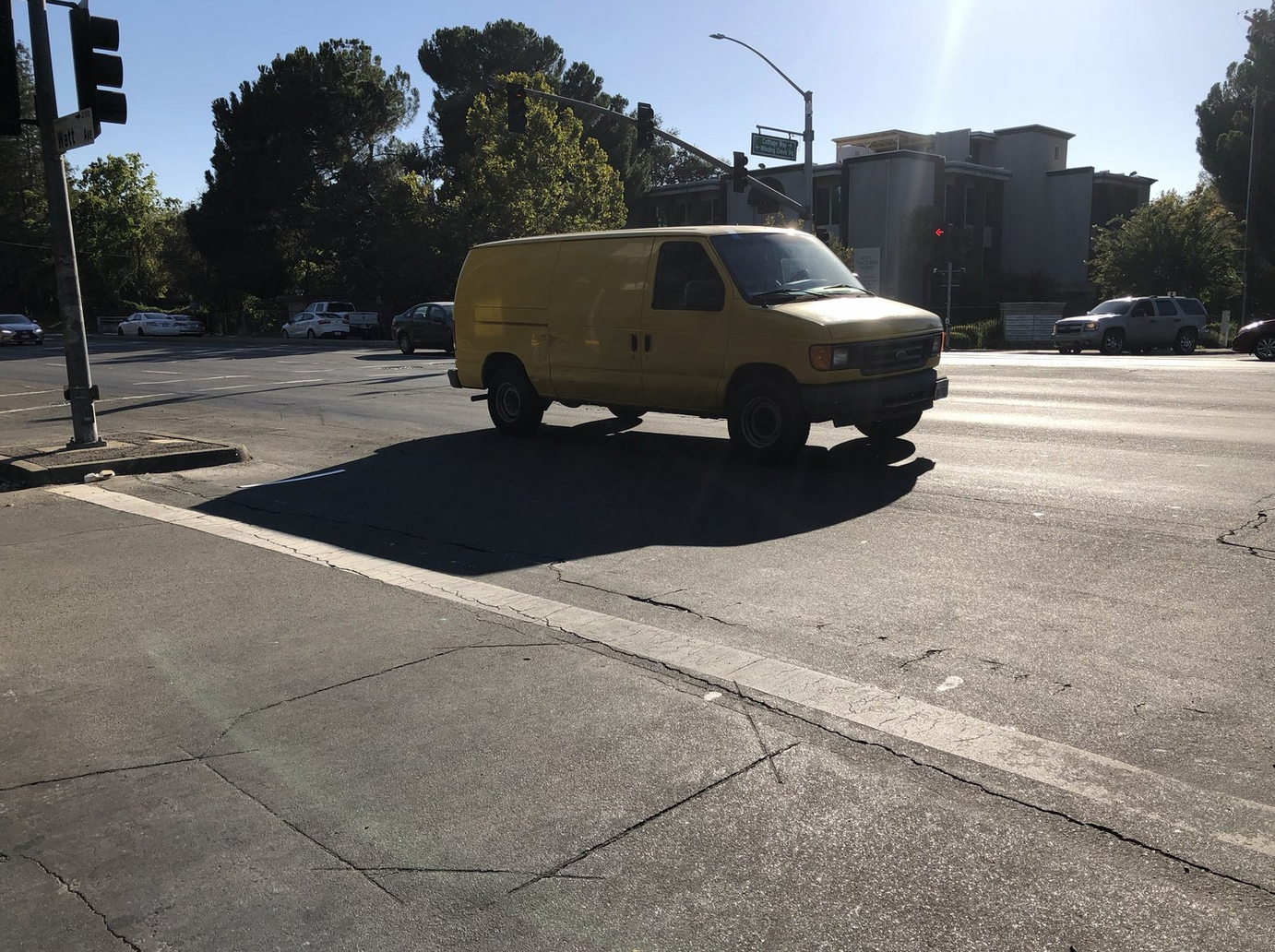 May contain: van, vehicle, transportation, car, automobile, tarmac, and asphalt
