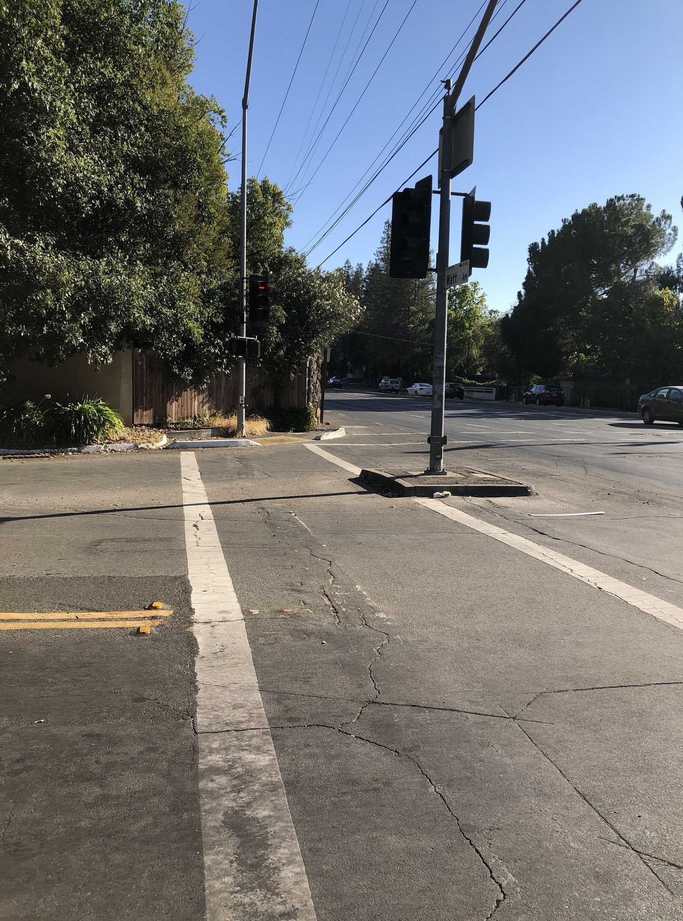 May contain: road, intersection, light, traffic light, asphalt, and tarmac