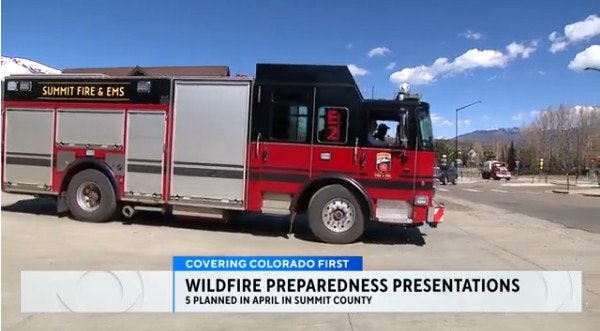 A fire truck is parked, with a report about wildfire preparedness presentations in Summit County, scheduled for April.