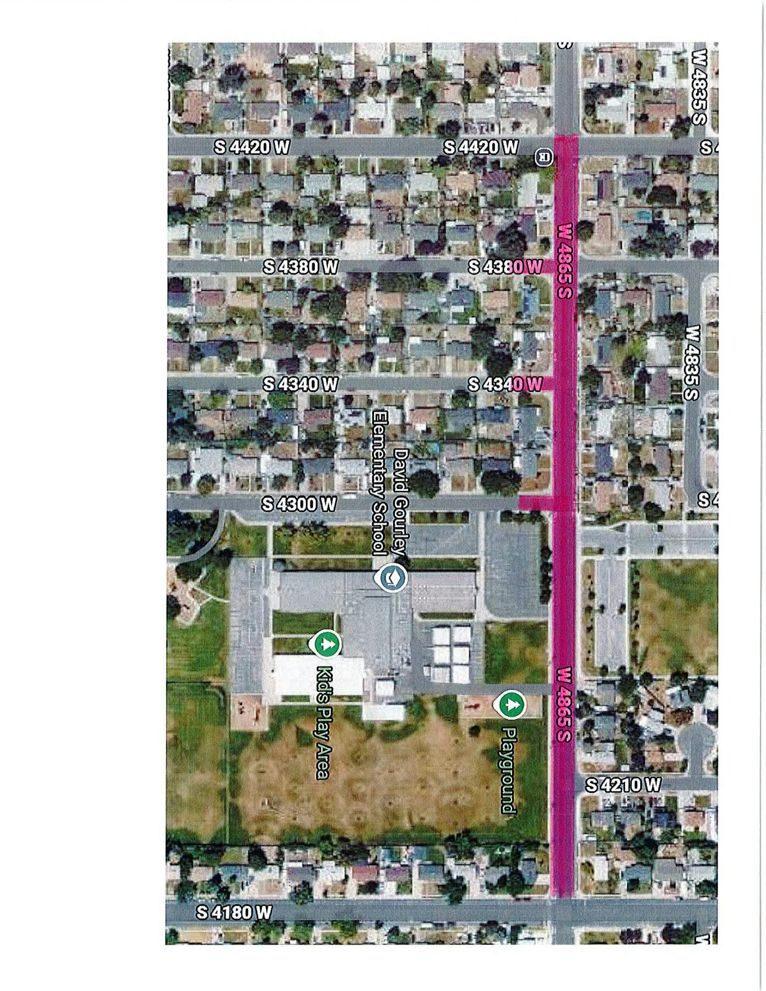 Aerial view map showing neighborhoods, roads, and David Gourley Elementary School with a playground and kids' play area nearby.