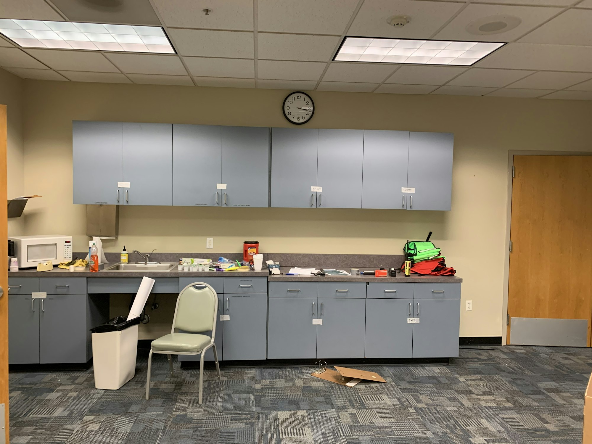 May contain: indoors, interior design, chair, furniture, floor, cup, accessories, bag, handbag, kitchen, appliance, device, electrical device, microwave, and oven