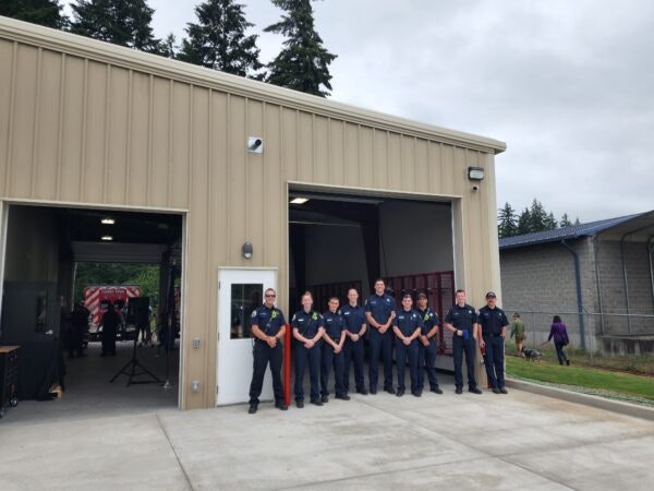 May contain: person, fire station, fire truck, transportation, truck, and vehicle