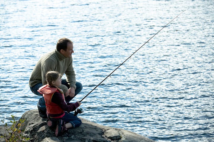 May contain: fishing, leisure activities, outdoors, water, adult, male, man, person, rock, angler, clothing, and pants