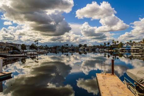 May contain: nature, outdoors, water, weather, cumulus, cloud, sky, waterfront, panoramic, scenery, landscape, pier, dock, and port