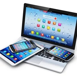 A laptop, tablet, and two smartphones displayed together, suggesting a connected tech ecosystem.