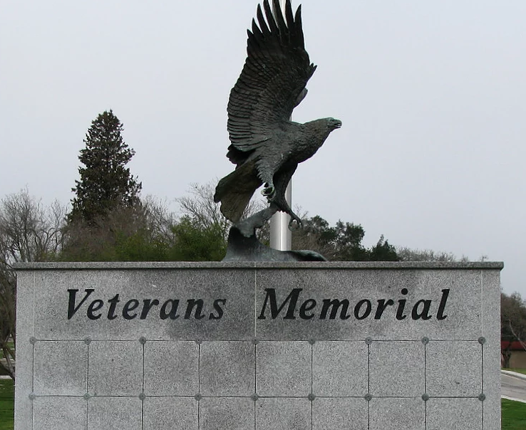 May contain: bronze eagle sculpture ontop of niche bank