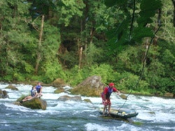 McKenzie Fire water rescue teams performing a rescue in Marten's rapids on the McKenzie River