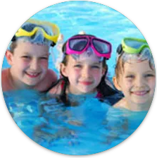 photo of 3 kids swimming