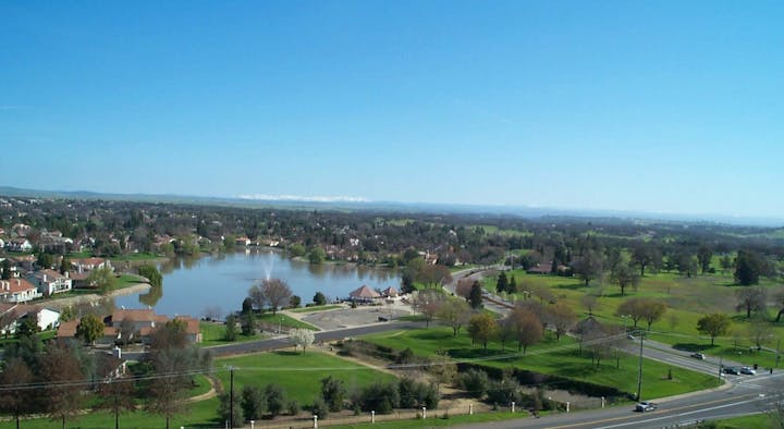 May contain: outdoors, lake, nature, water, grass, plant, and scenery