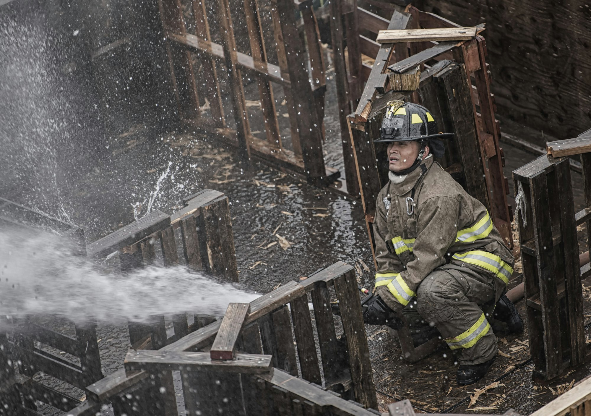 May contain: helmet, clothing, apparel, person, human, and fireman