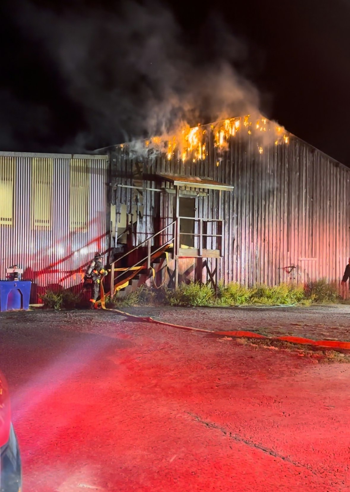 Firefighters fighting a fire on a commercial structure.