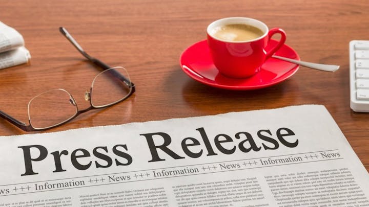 newspaper reading Press Release, glasses, accessory, coffee cup, and spoon