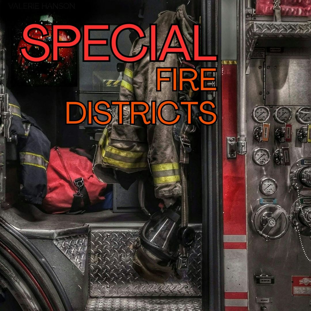 Firefighter gear on a truck with "SPECIAL FIRE DISTRICTS" text.