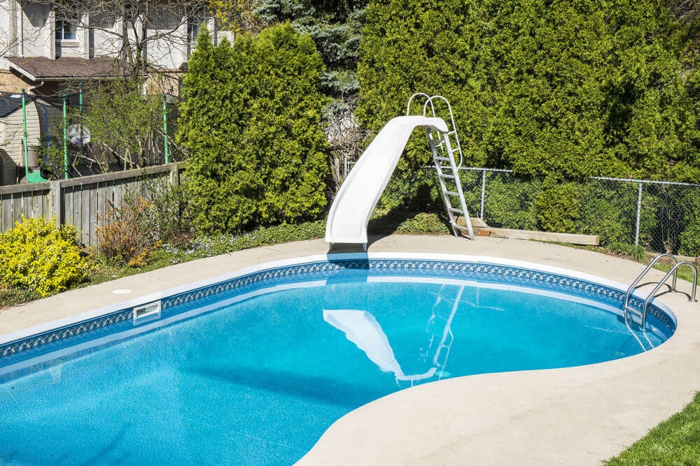 May contain: pool, water, housing, building, villa, house, and swimming pool