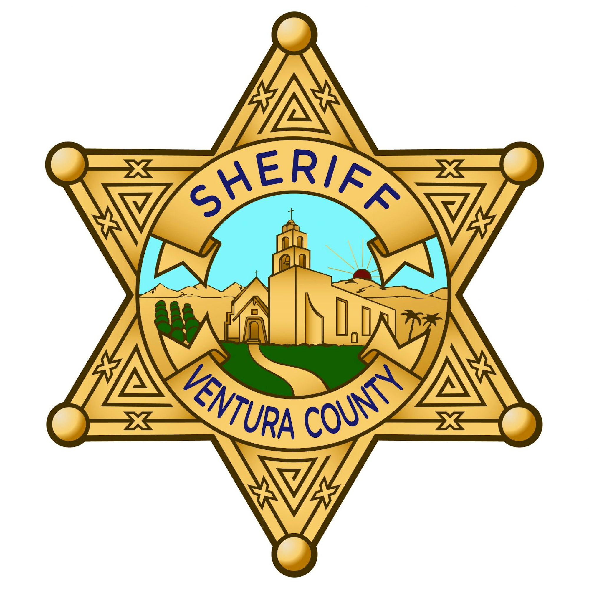 Ventura County Sheriff badge with mission illustration and mountain backdrop.