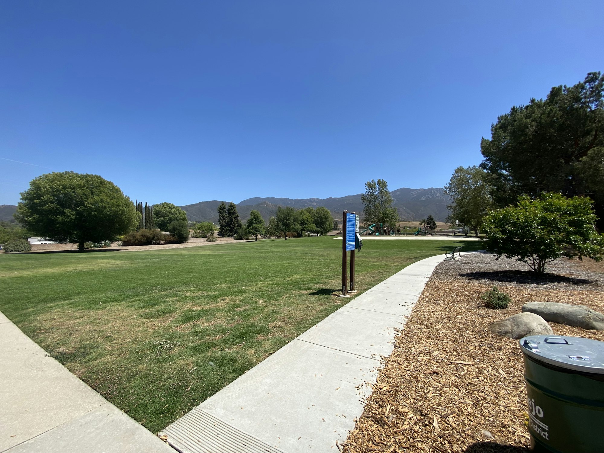 May contain: grass, plant, nature, outdoors, park, tree, path, lawn, and scenery