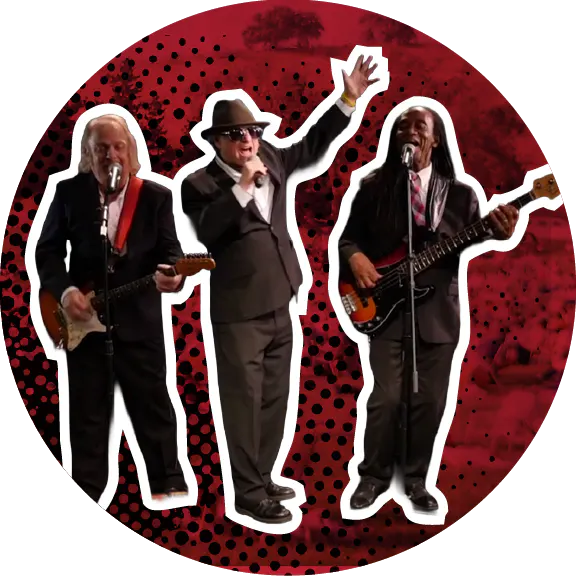 The image features three musicians performing together, dressed in suits, with vibrant backgrounds and instruments.