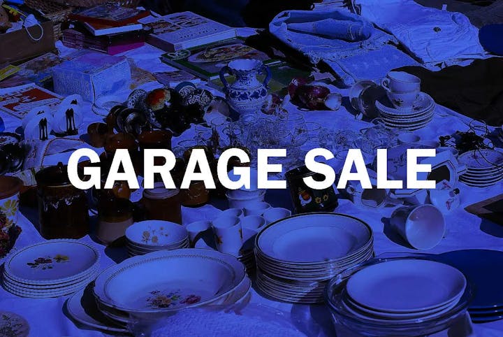 Household items displayed for a garage sale.