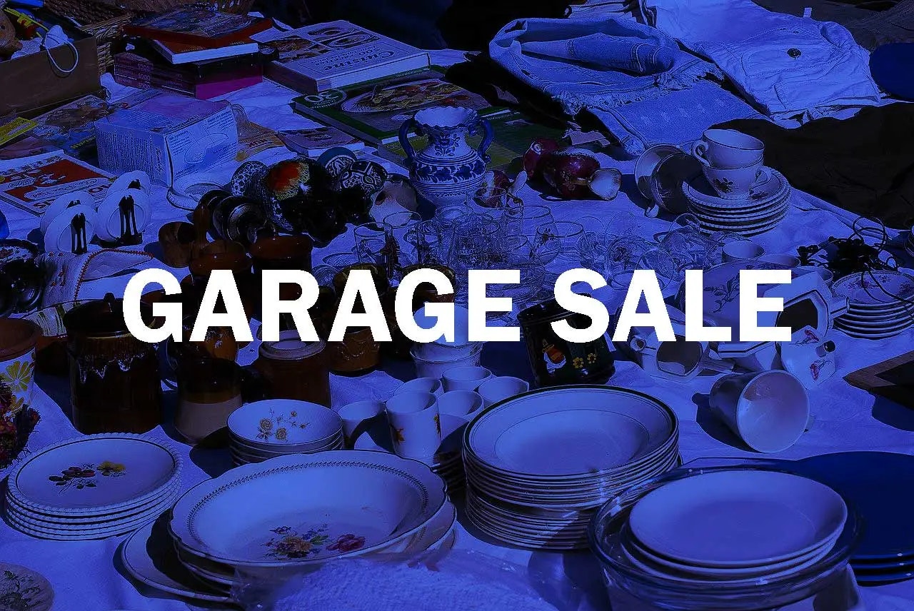 Household items displayed for a garage sale.