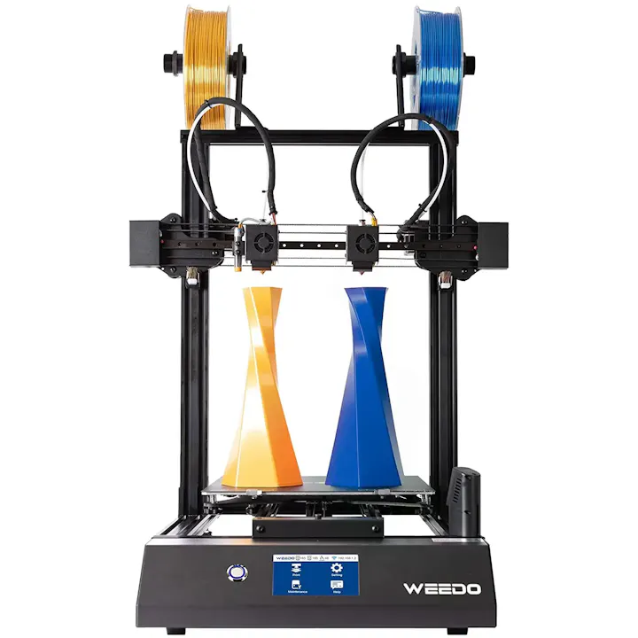 A 3D printer with dual extruders, printing vibrant yellow and blue twisted vases on a heated bed.