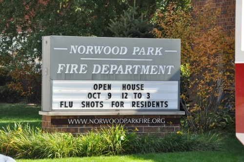 Norwood Park Fire Department sign: Open House Oct 9, 12-3, flu shots for residents.