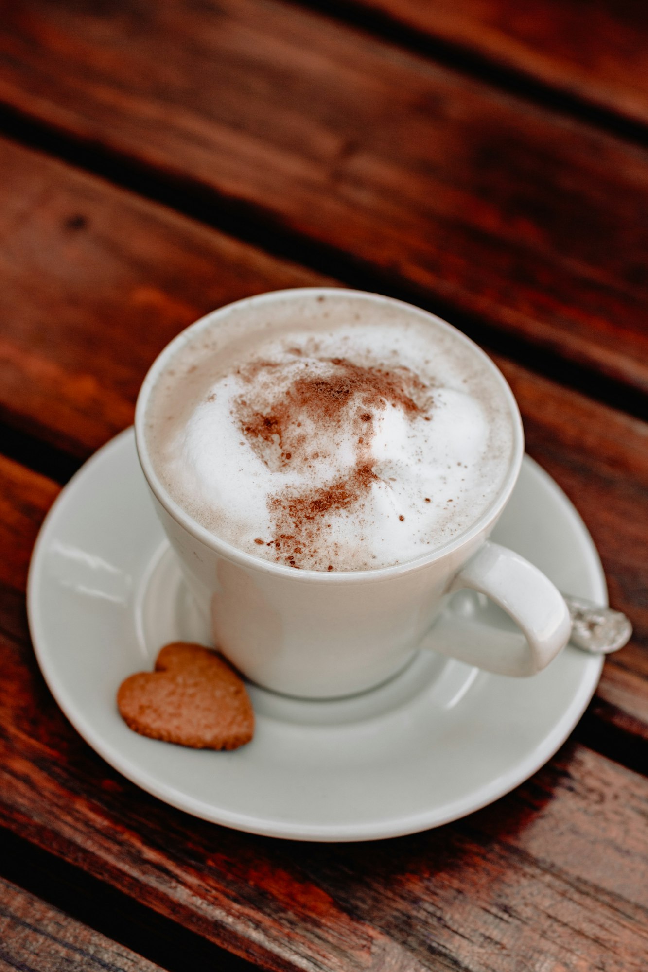 May contain: latte, drink, beverage, coffee cup, cup, saucer, and pottery