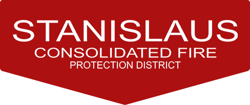 A logo for "Stanislaus Consolidated Fire Protection District" on a red background.