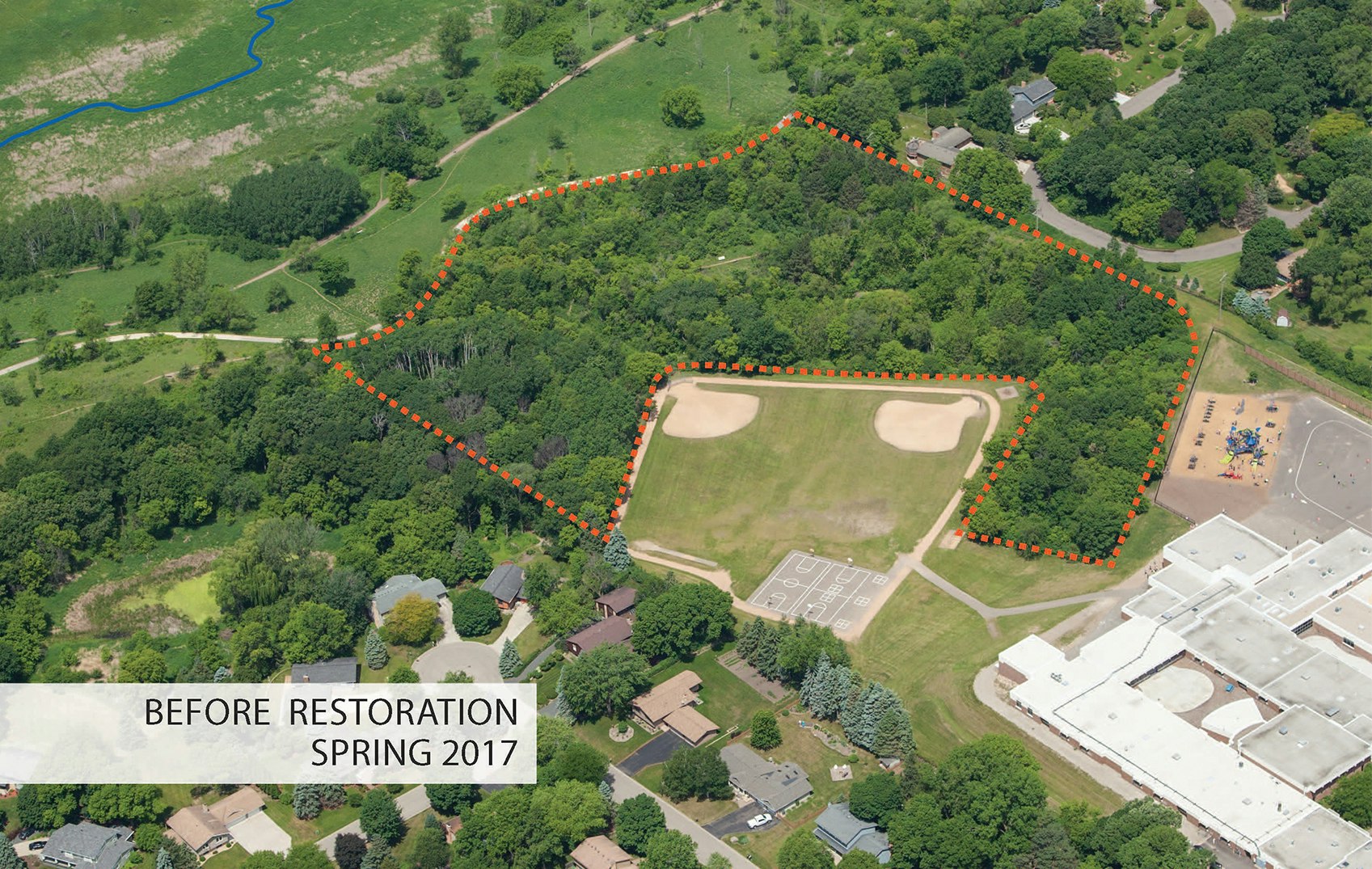 Aerial photo of a park with labeled restoration area, baseball fields, parking, and a playground before work began in spring 2017.