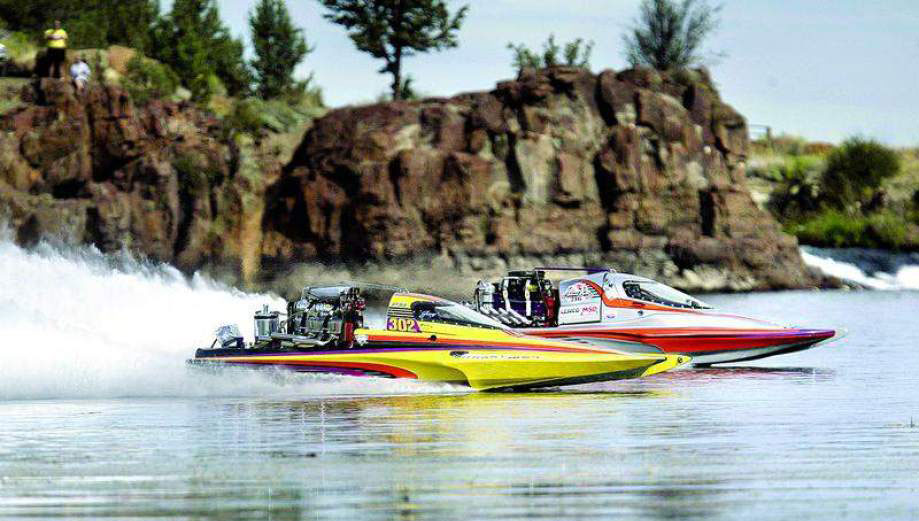 Photo of Speed boats on a body of water