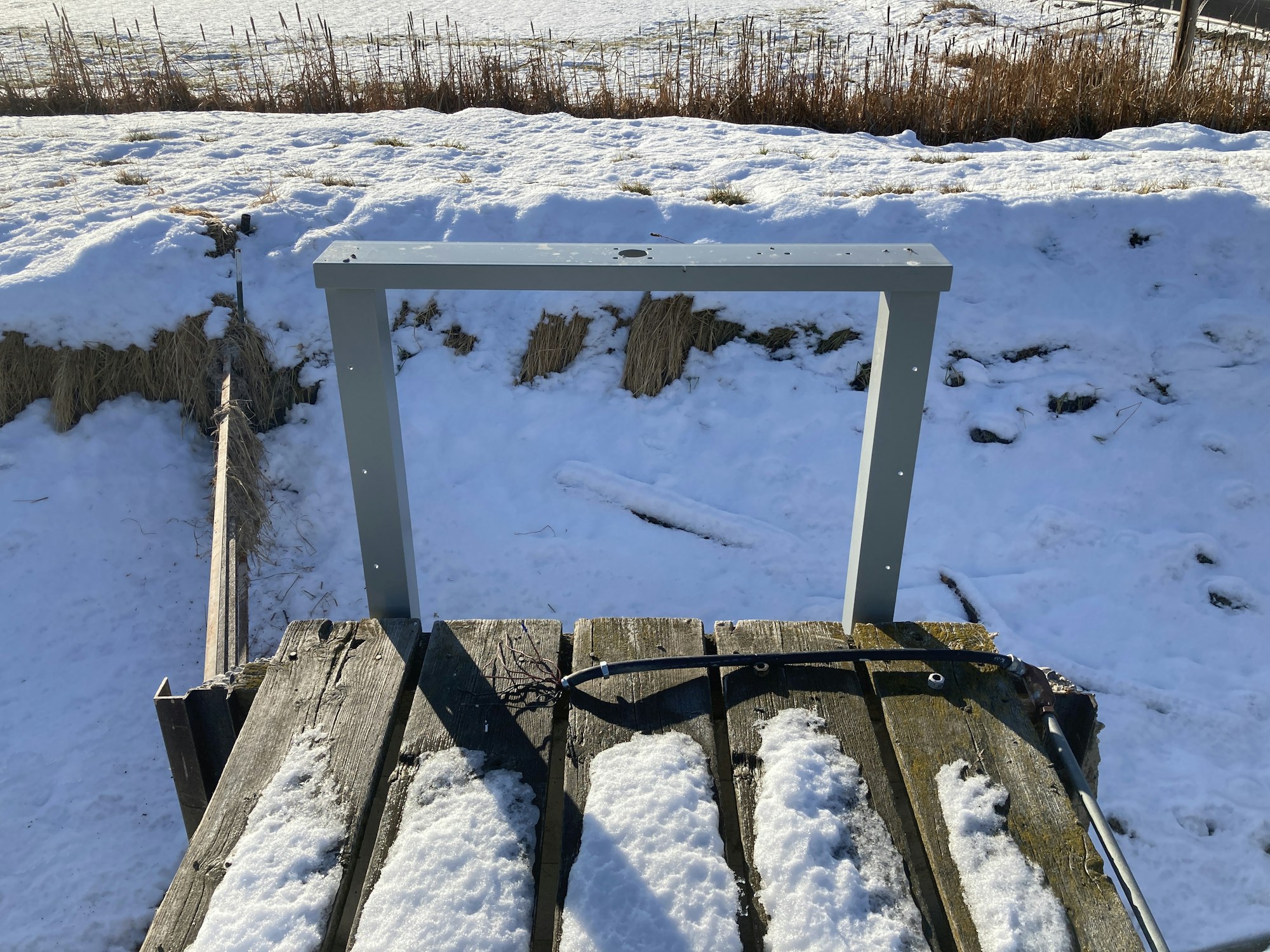May contain: nature, outdoors, weather, ice, wood, handrail, plant, and tree