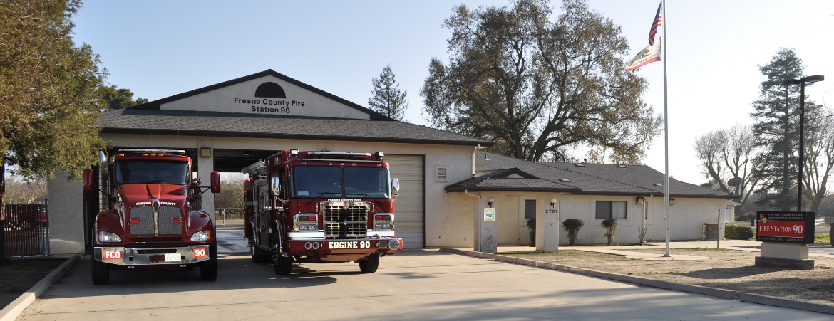 Fresno County Fire Station 90 in Caruthers with a Fire Engine and Water tender in front of facility