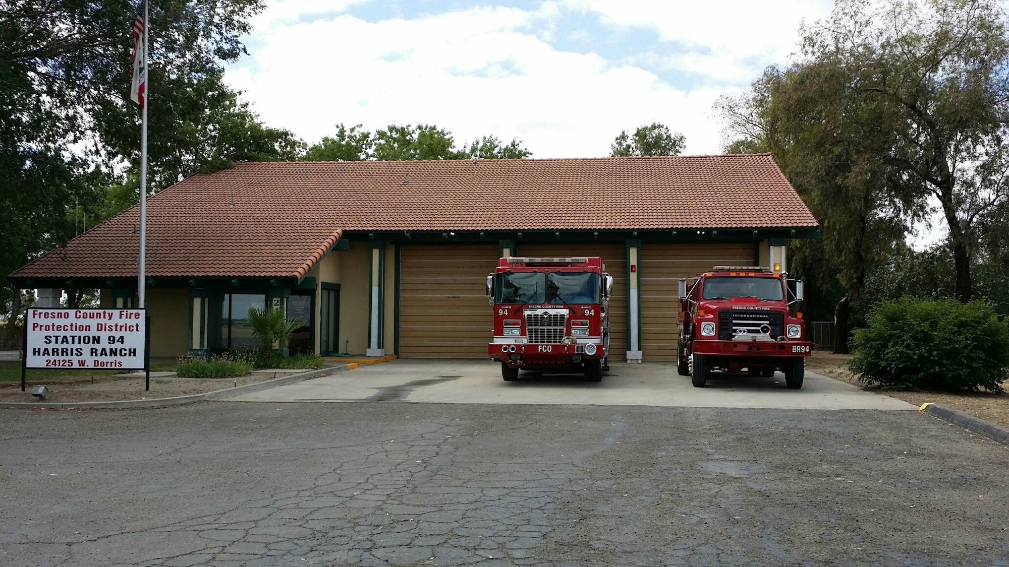 fire trucks in front of fire station