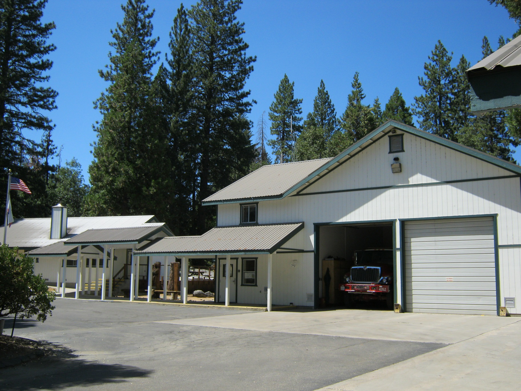 fire trucks in apparatus bay of fire station