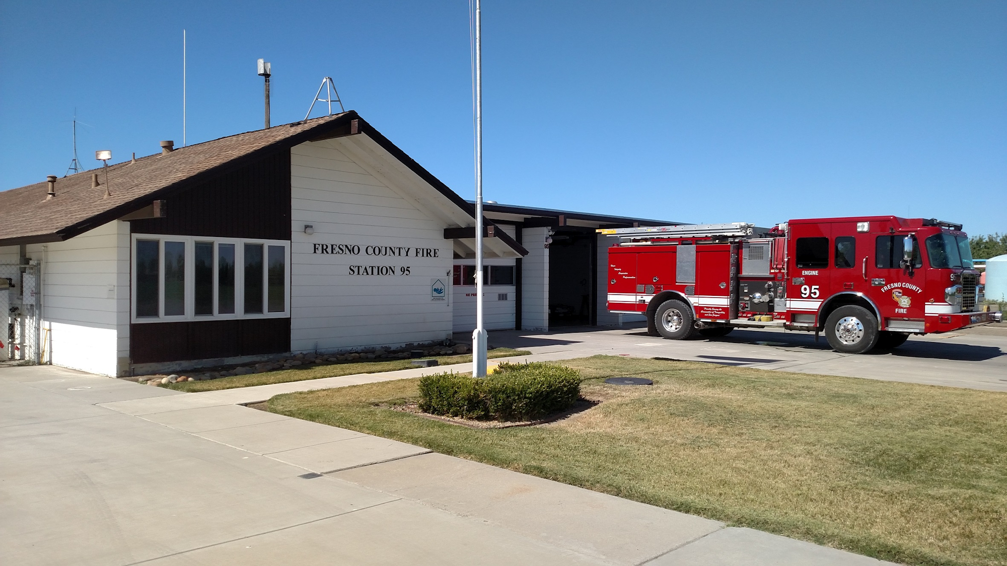 fire trucks in front of fire station