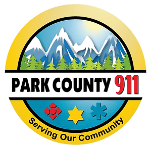 A badge-like logo with mountains, "PARK COUNTY 911," and "Serving Our Community."