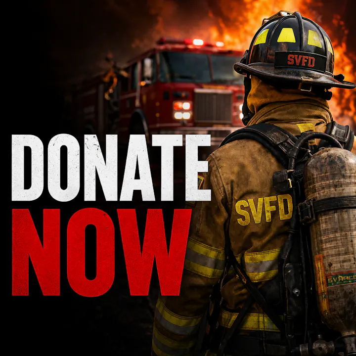 A firefighter stands against a burning backdrop, urging people to "DONATE NOW" for support.
