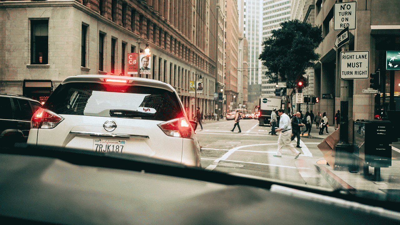 Cars on road with alert