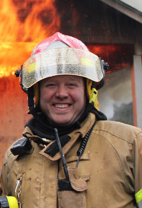 May contain: human, person, helmet, apparel, clothing, and fireman