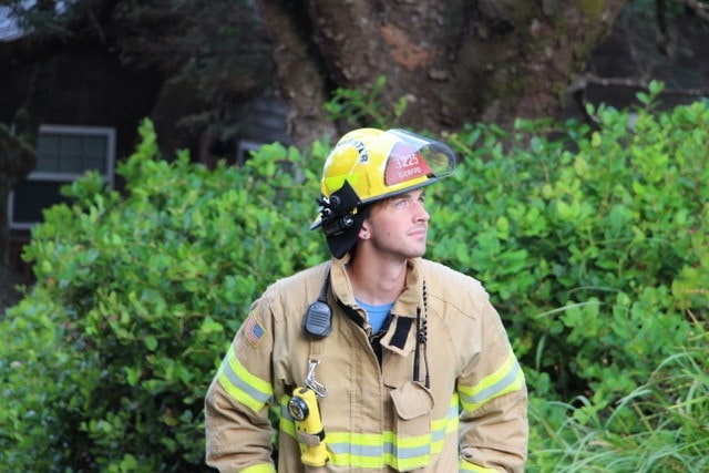 May contain: helmet, clothing, apparel, person, human, and fireman