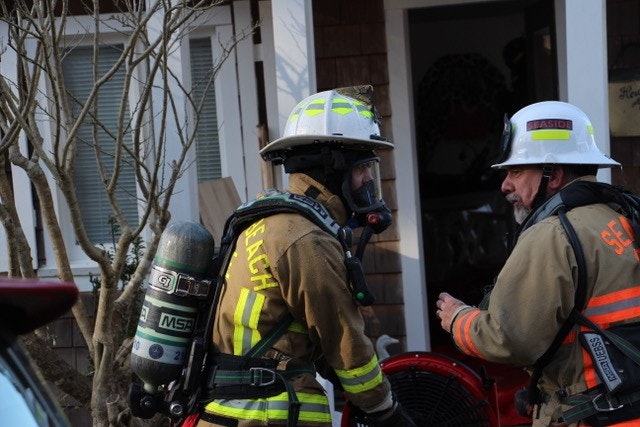 May contain: helmet, clothing, apparel, fireman, person, and human