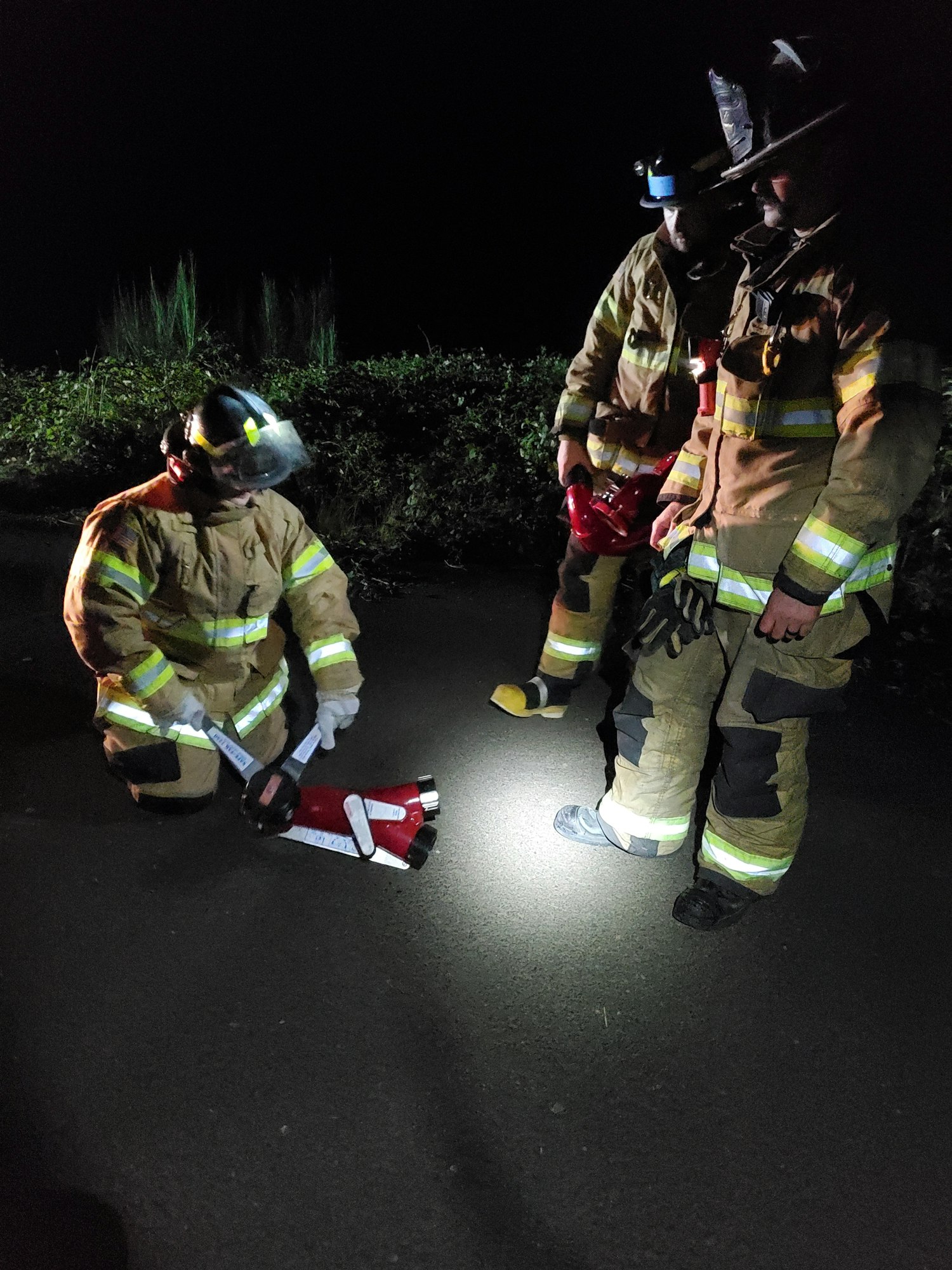 May contain: person, human, fireman, helmet, clothing, and apparel