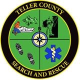 A circular logo for Teller County Search and Rescue featuring icons for outdoor activities, medical assistance, and navigation.