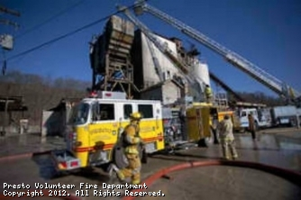 Photo of firefighters working