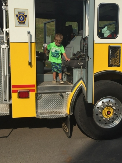 May contain: machine, wheel, boy, child, male, person, transportation, and vehicle