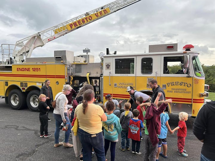 May contain: clothing, footwear, shoe, person, adult, female, woman, male, man, accessories, bag, handbag, transportation, truck, and vehicle