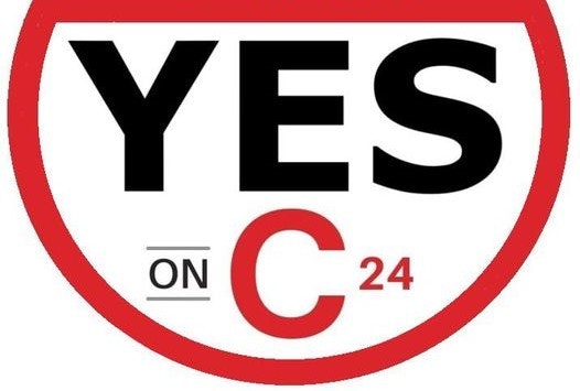 "YES on C24" inside a red-bordered circle, promoting a message or campaign.